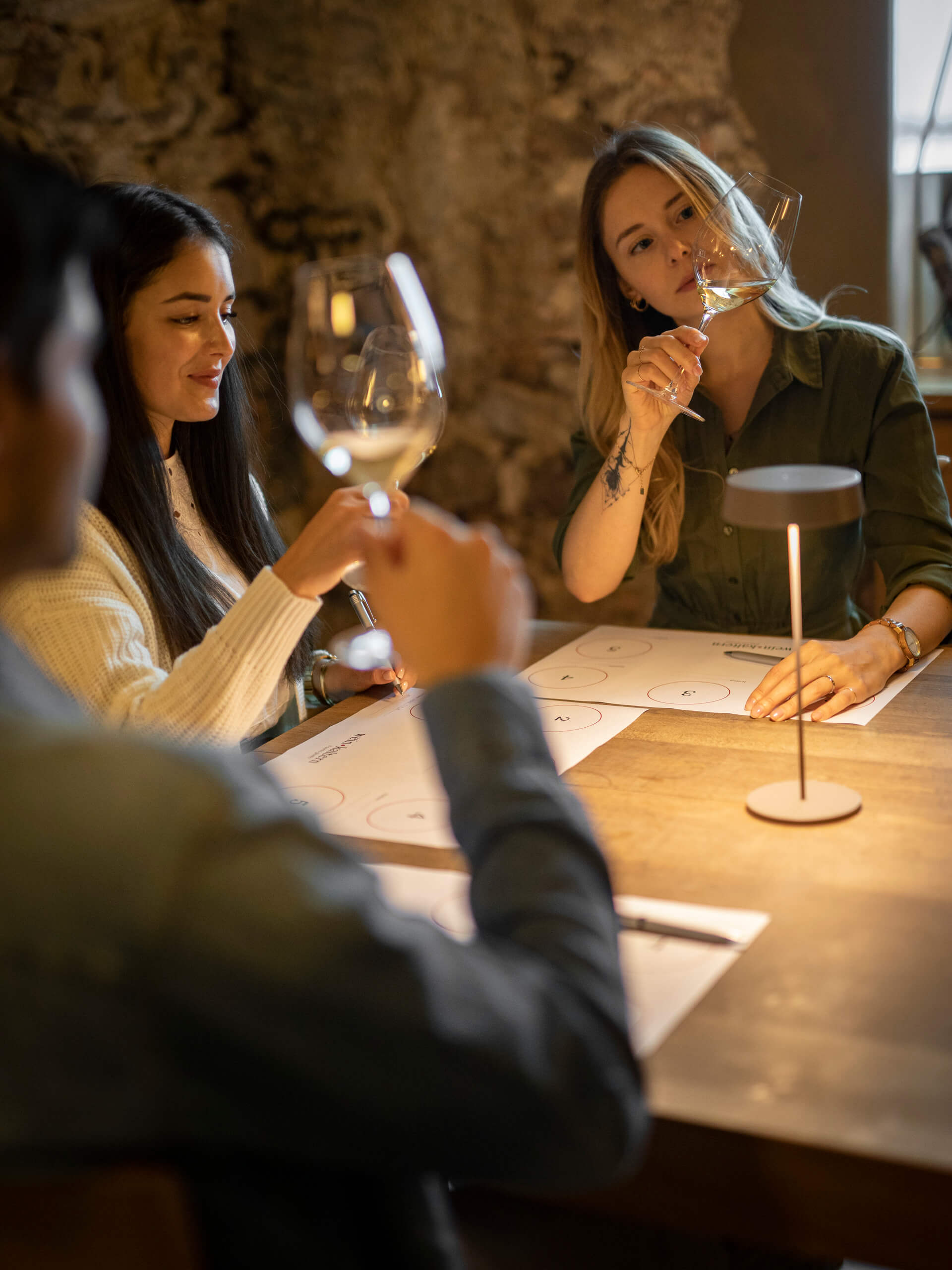women enjoying wine